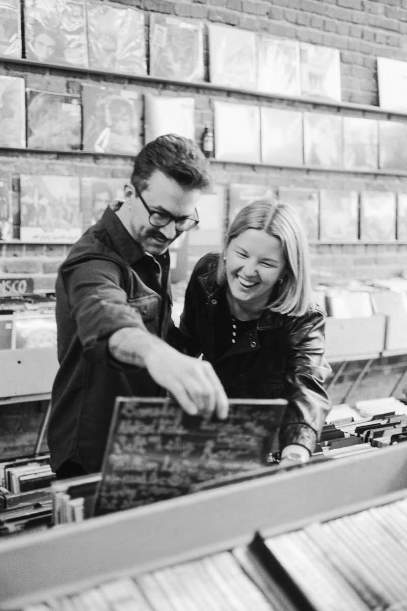 Candid engagement portrait on film in Capitol Hill