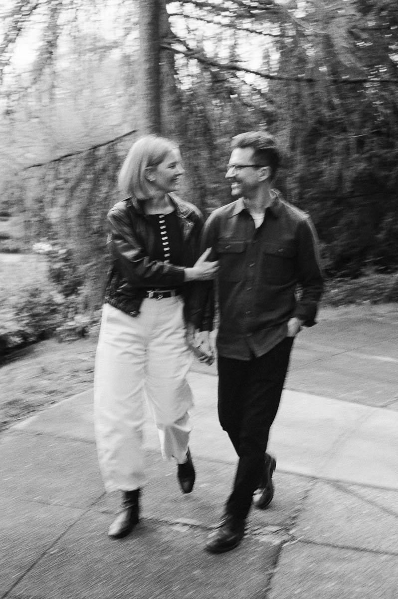 Couple walking through Capitol Hill Seattle during film engagement session