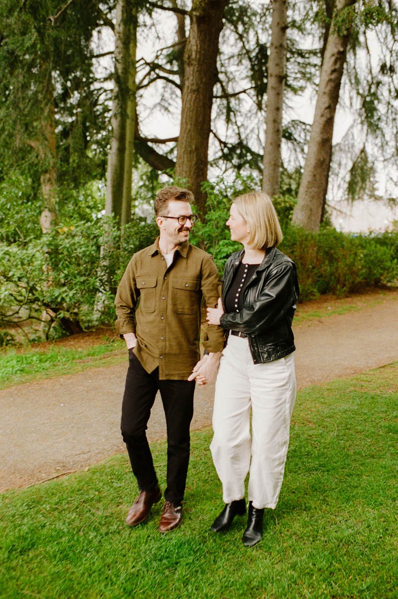 Couple walking through Capitol Hill Seattle during film engagement session