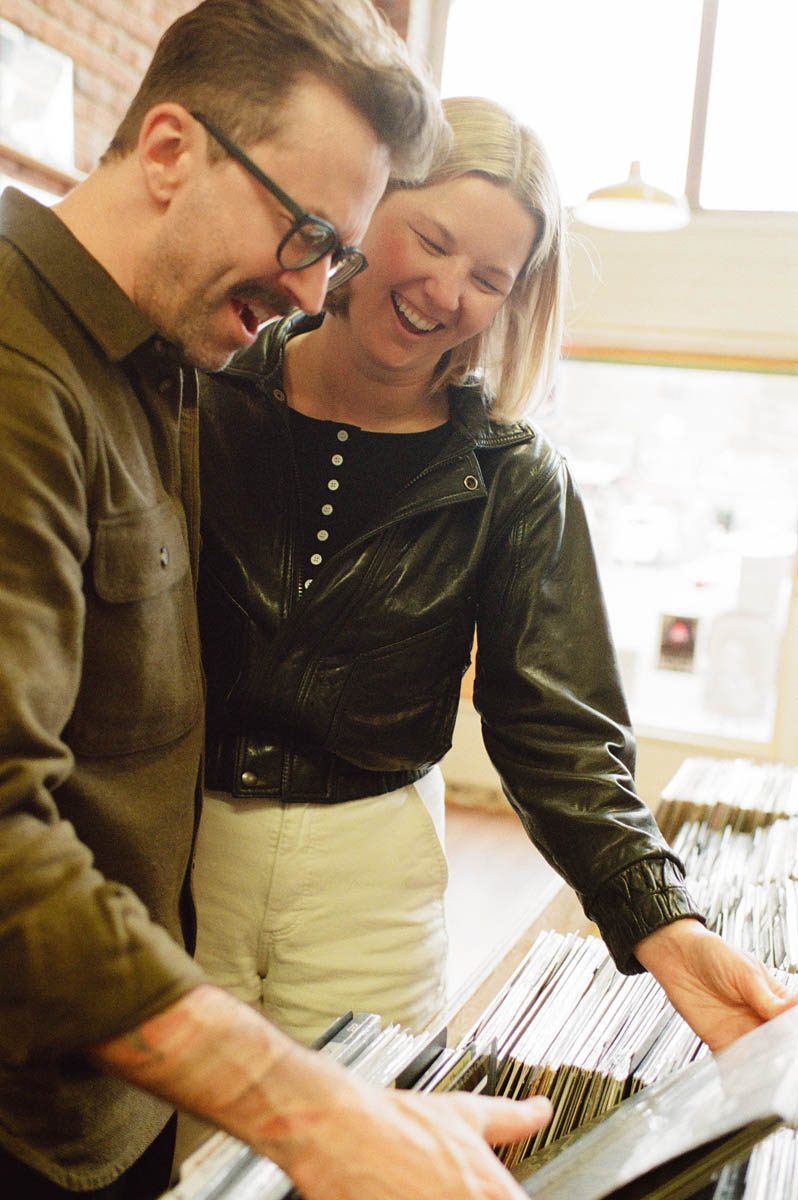 Couple laughing together during Seattle engagement session